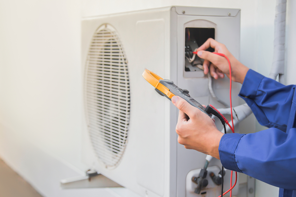 Technician using advanced technology to work on an HVAC system - Toronto HVAC Company Springbank Mechanical