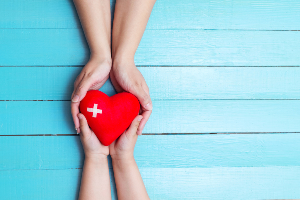 People Holding A Heart Symbolizing Health And Wellbeing - Springbank Mechanical Toronto